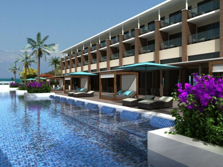 Piscina e quartos do Hotel H10 Ocean Vista Azul
