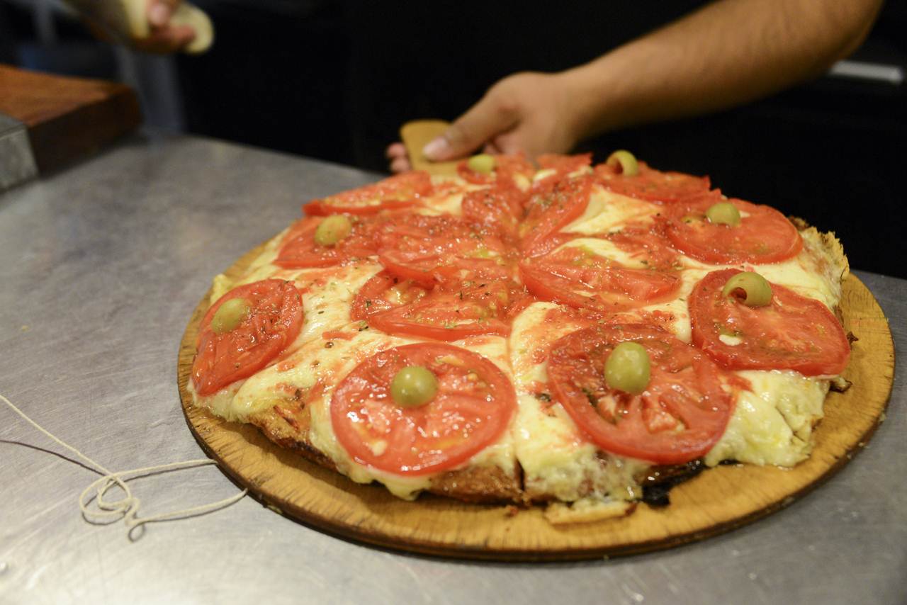 Pizza num restaurante italiano de Buenos Aires