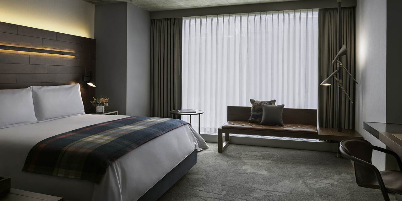 Quarto do the DOUGLAS, an Autograph Collection Hotel