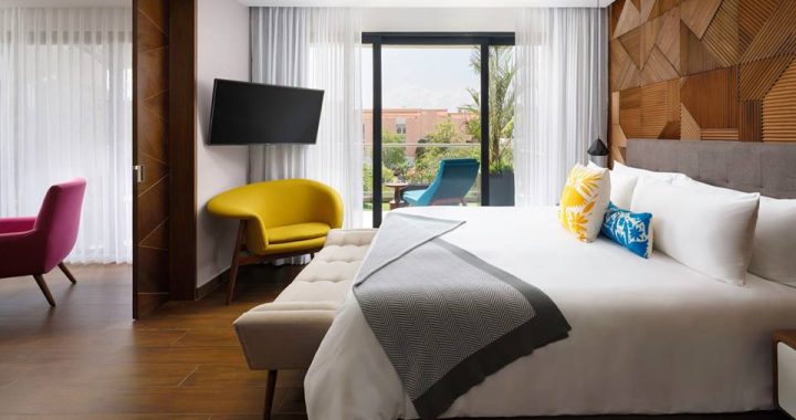 Quarto do The Fives Downtown Hotel & Residences, Curio Collection by Hilton