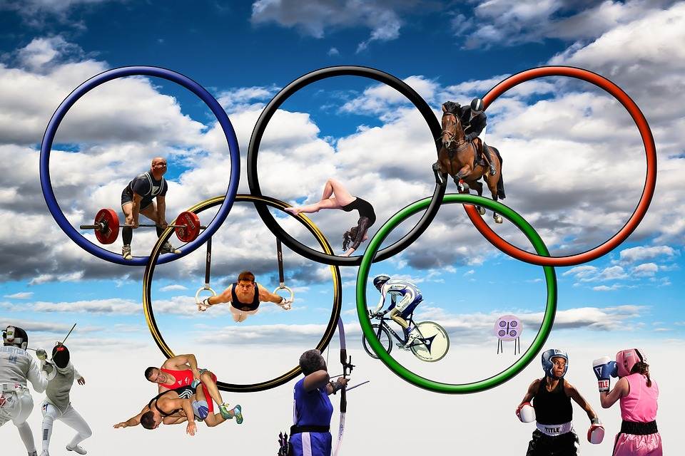 Símbolo dos Jogos Olímpicos com atletas de várias modalidades